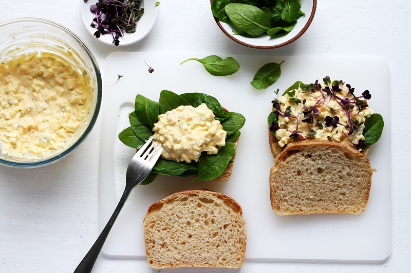 Assembling the best egg salad sandwich