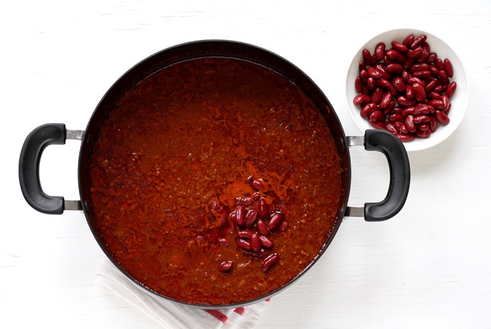 adding beans to chili