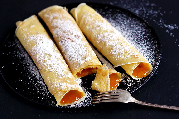 Crepes filled with apricot jam Palatschinken recipe