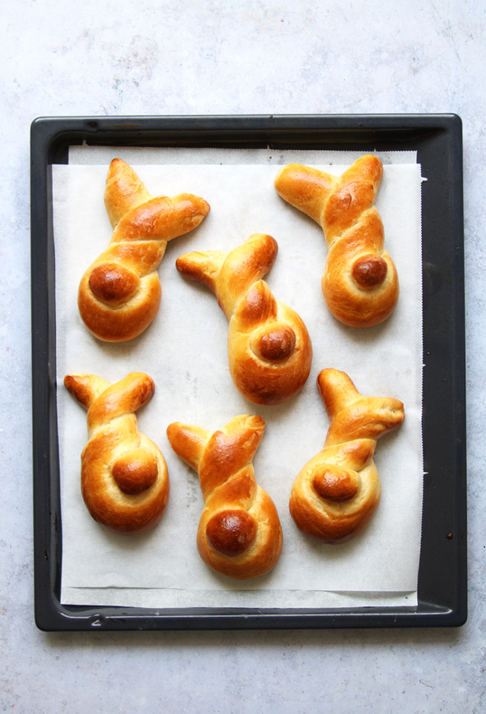 Easter bunny rolls on baking sheet