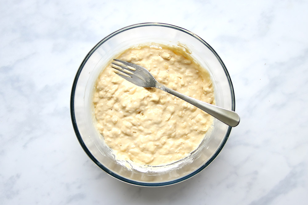 Mixed pancake batter in bowl