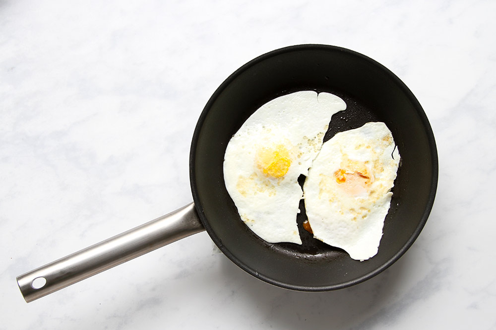 fried eggs in pan