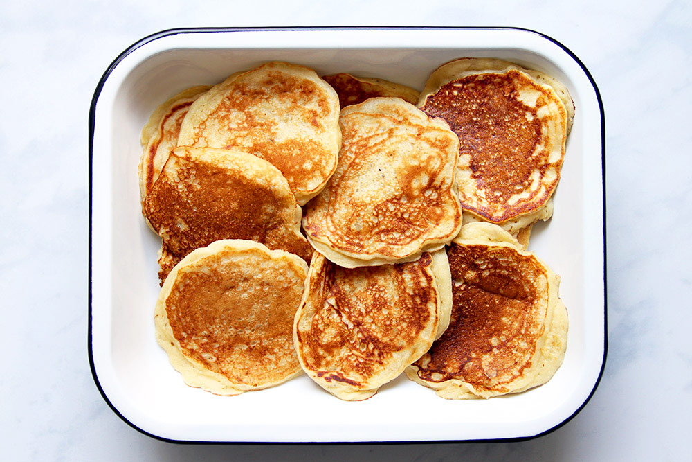 Cooked banana pancakes in tray