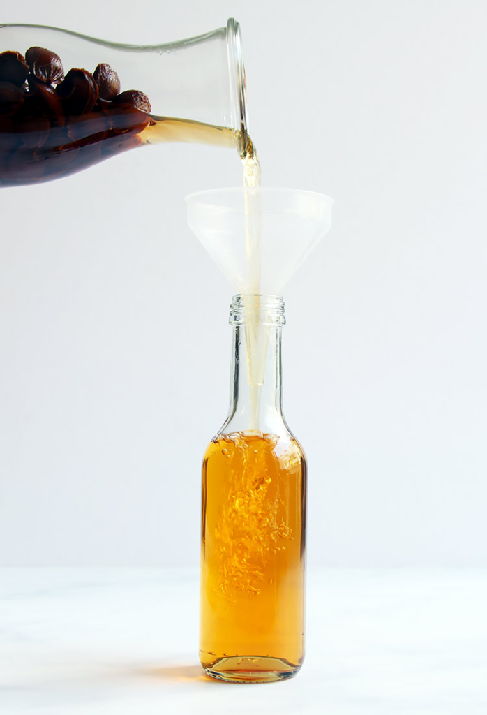 Homemade recipe amaretto liqueur with apricot stones