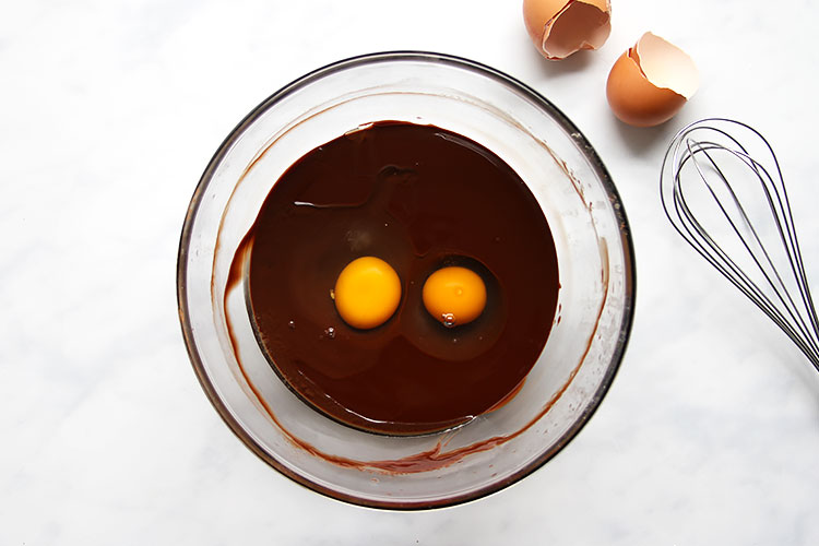 Bowl with chocolate and eggs