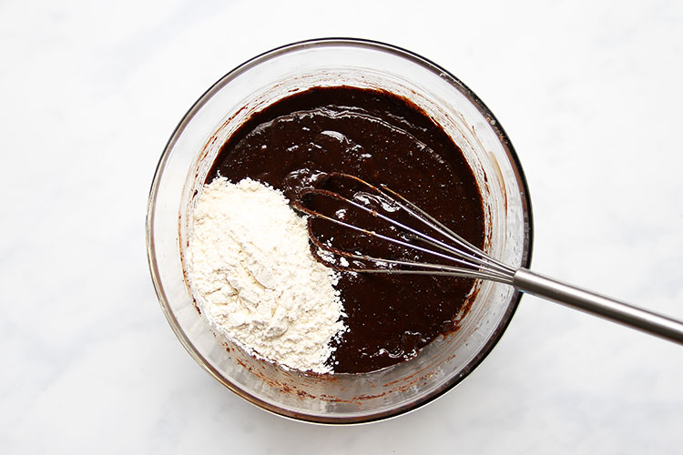 Bowl with batter and flour