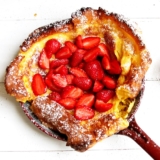 Recipe for a super fluffy Dutch Baby with Strawberries