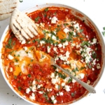 Shakshuka with fresh tomatoes in pan