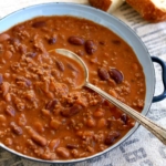 chili con carne with beer in bowl