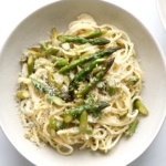 Green asparagus pasta on plate
