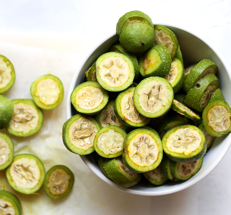 Sliced green walnuts for walnut liqueur recipe