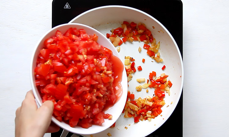 Saute onion, pepper, and tomatoes