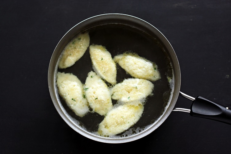 While simmering in salted water or broth, the Nockerl will double in bulk.